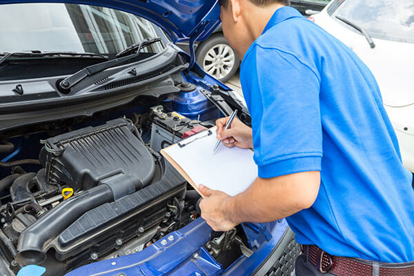 car repair inspection with mechanic